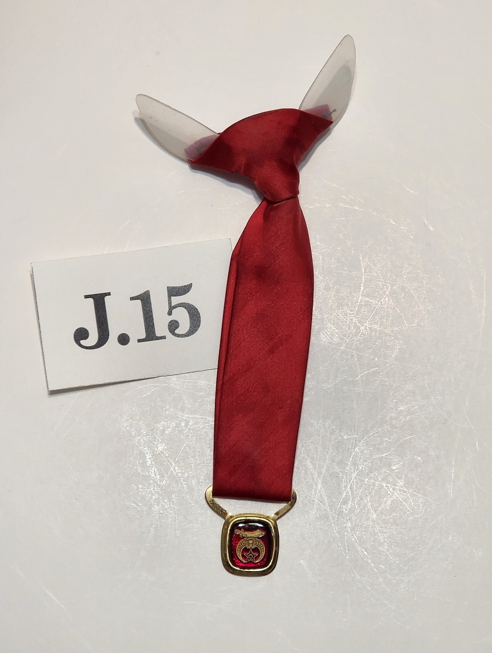 J.015- Shriners red maroon clip-on tie with pendant, pre-owned